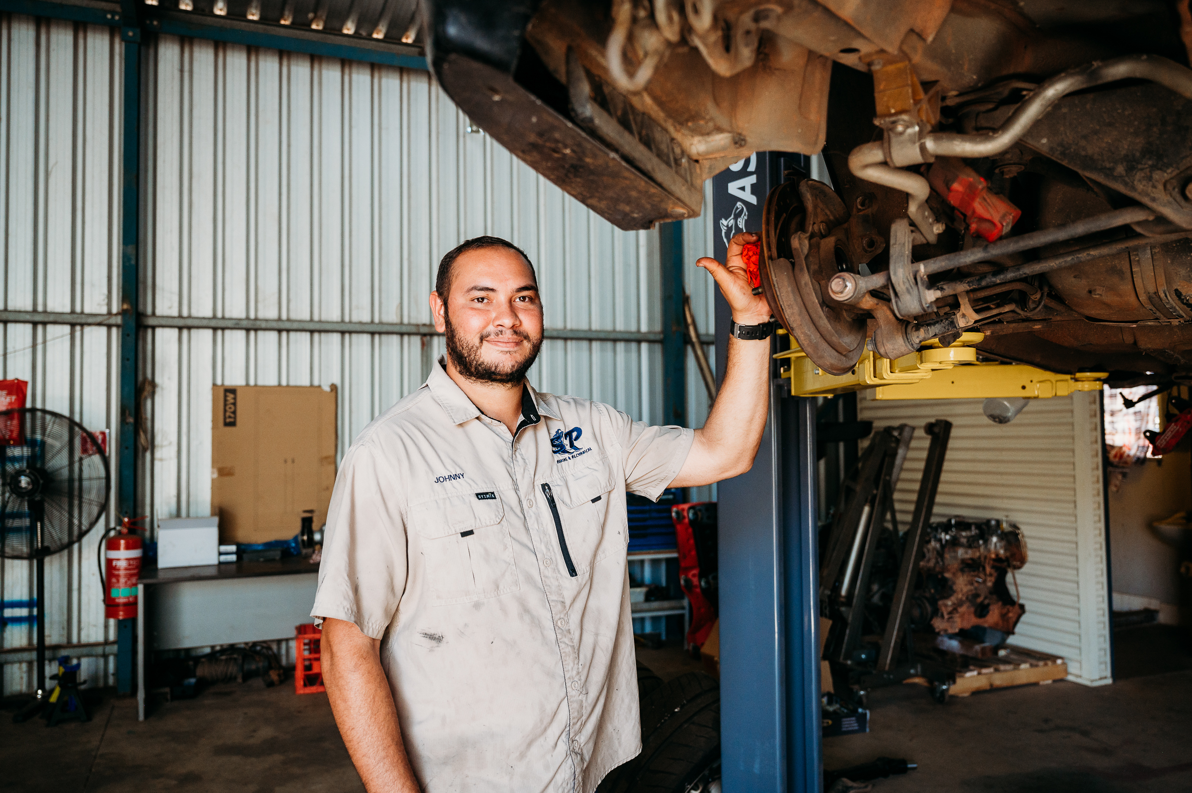 Mechanic working on a car in a workshop